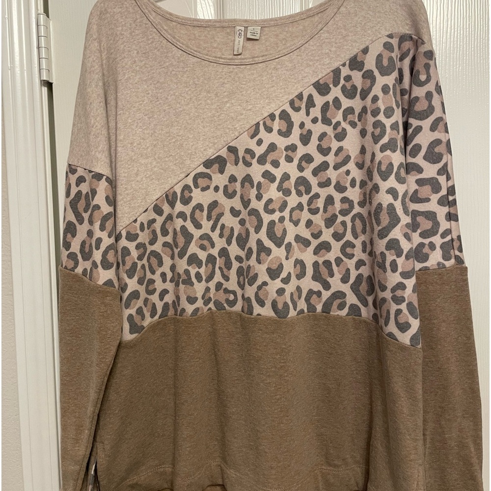 Leopard print sweater. Brand new w/o tags. Never worn.